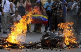 Confrontos nas praças na Venezuela.